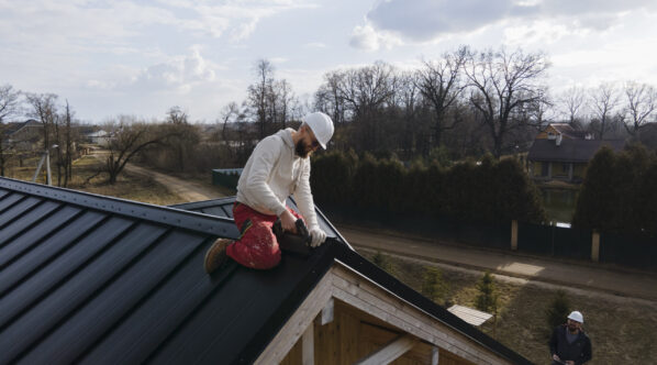 full-shot-roofer-working-with-helmet